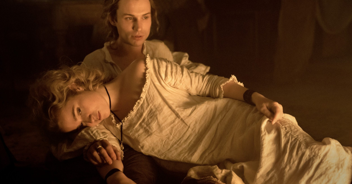 Dangerous Liaisons- a man carrying a woman who looks to have fainted.